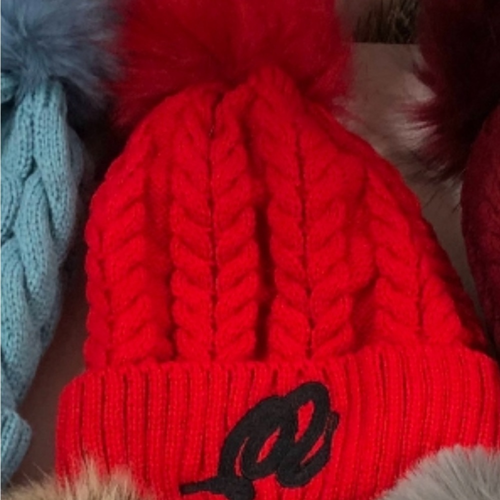 Pom Pom winter hats with fur inside to keep your head warm